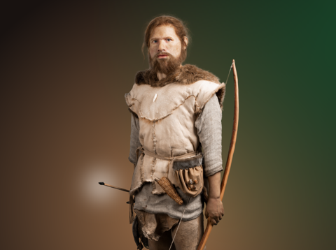 Cees met vuurstenen boog en pijlpunt