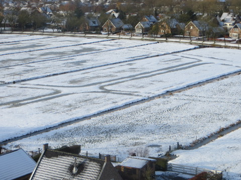 Stadsweide Bunschoten bedekt met sneeuw en ijs